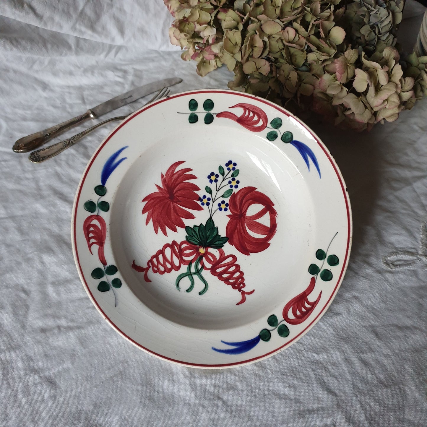 Antique spongeware soup plate crimson red floral w green & blue accents, late 19thC earthenware / ironstone / tin glazed Welsh pottery