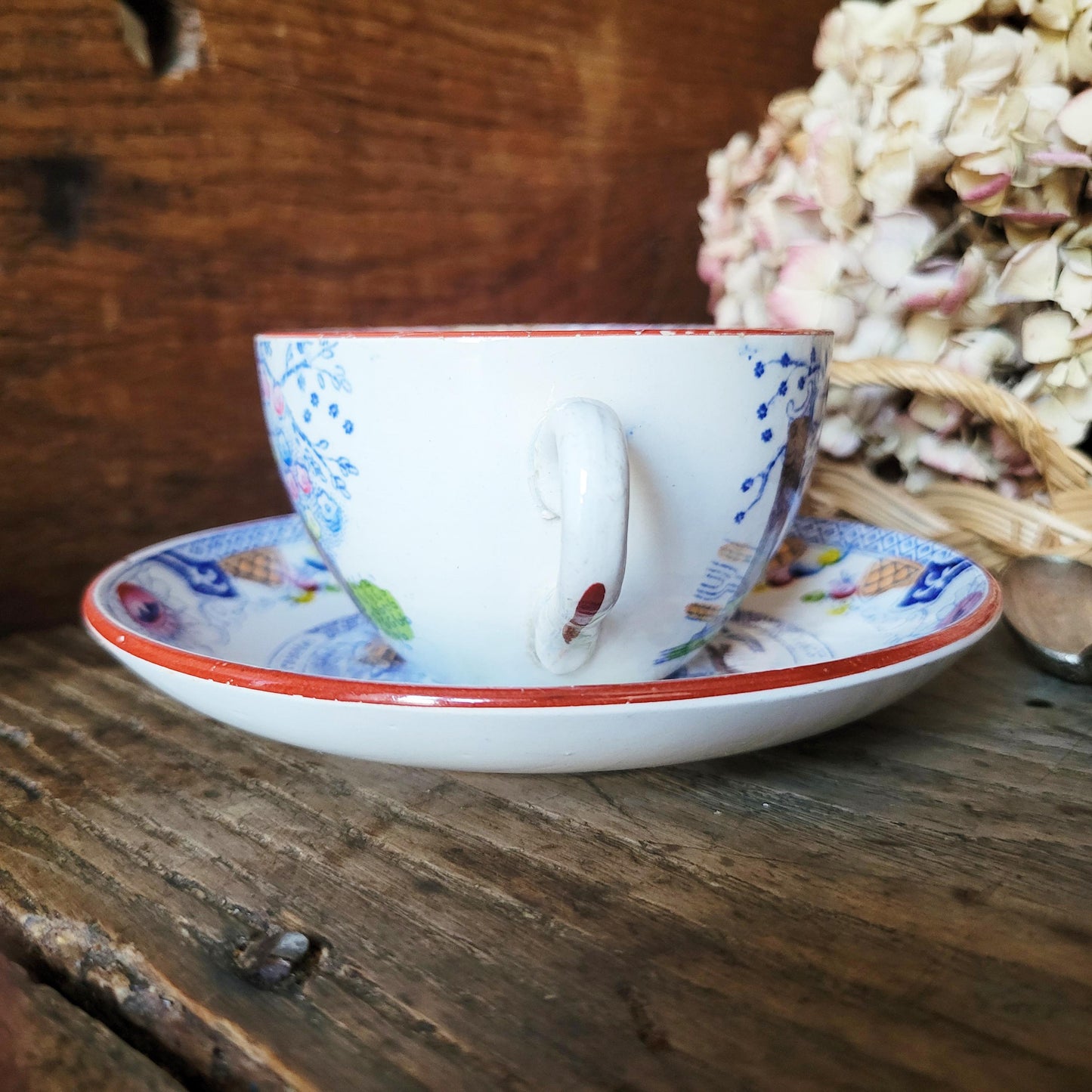 Sarreguemines tea / coffee / chocolate cup & saucer duo, French Chinoiserie style hand colored polychrome on blue transferware c1890 France