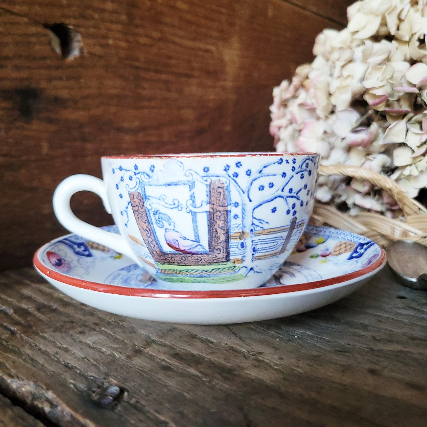 Sarreguemines tea / coffee / chocolate cup & saucer duo, French Chinoiserie style hand colored polychrome on blue transferware c1890 France