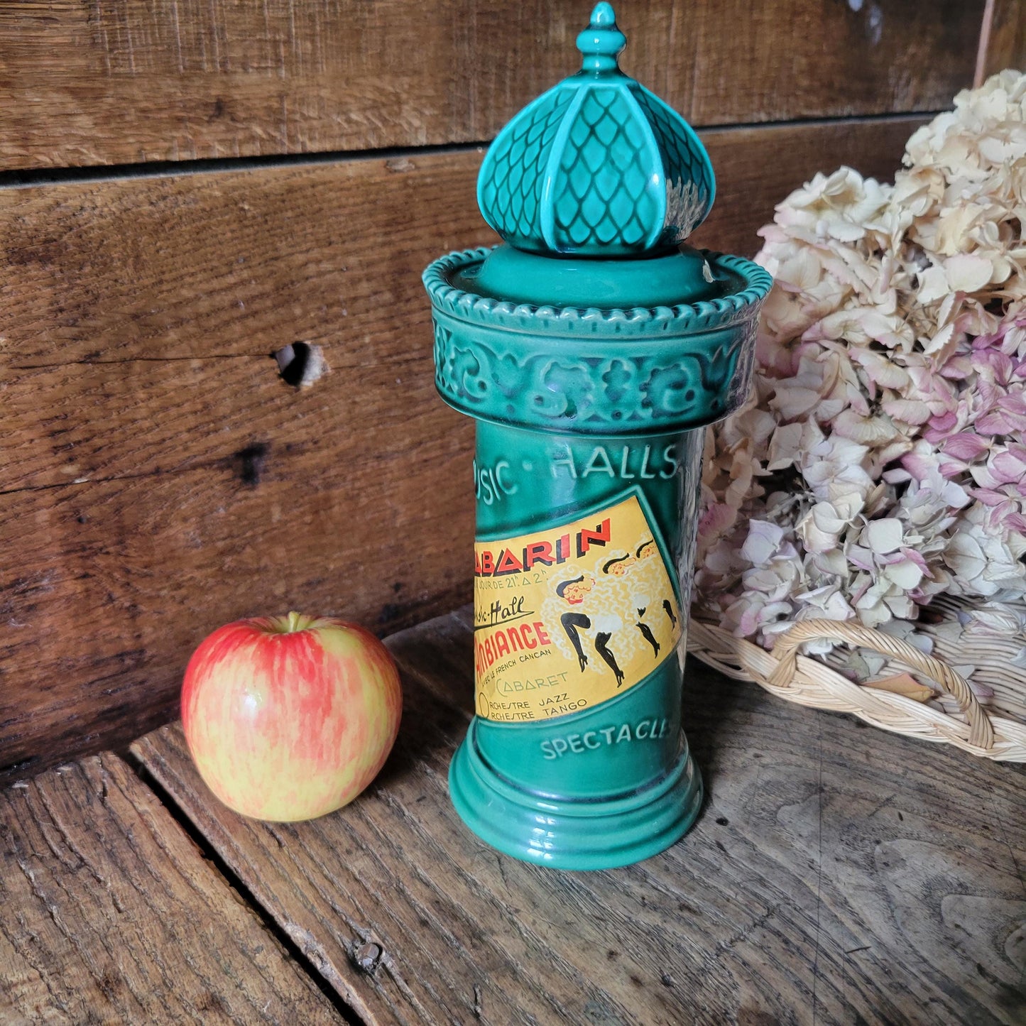 French vintage 'Morris Column' ceramic green bottle, w intact stopper & posters of Moulin Rouge, excellent cond. Franor Royale, France c1950