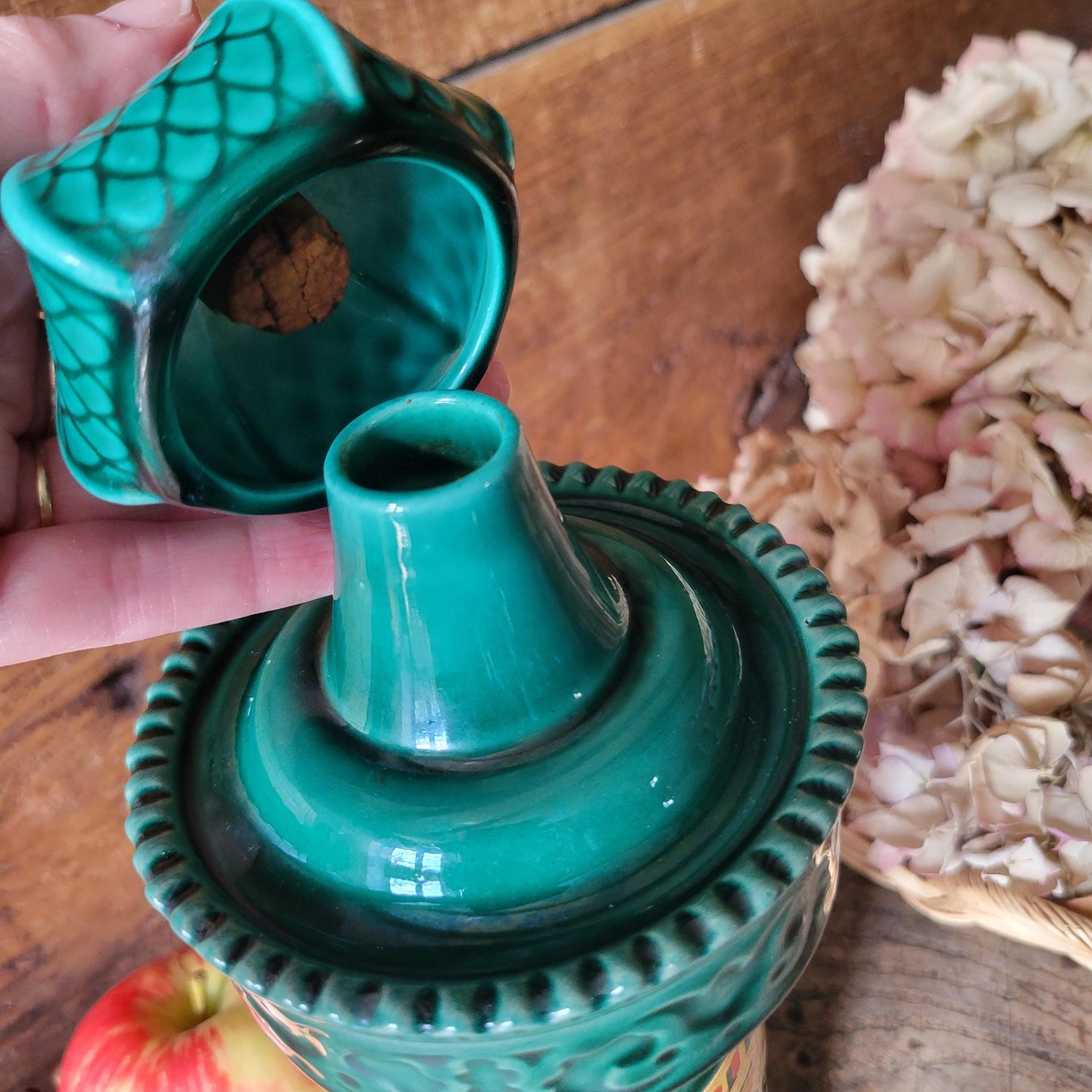 French vintage 'Morris Column' ceramic green bottle, w intact stopper & posters of Moulin Rouge, excellent cond. Franor Royale, France c1950