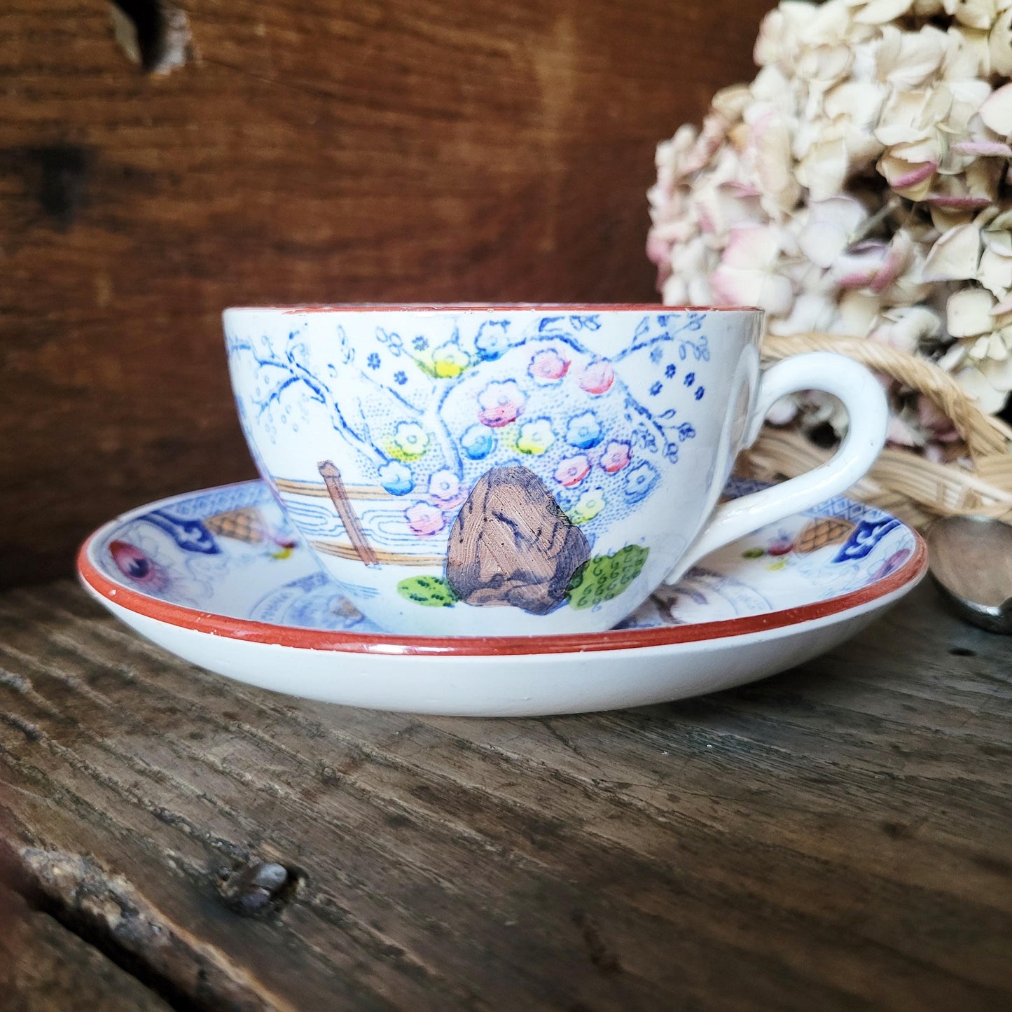 Sarreguemines tea / coffee / chocolate cup & saucer duo, French Chinoiserie style hand colored polychrome on blue transferware c1890 France