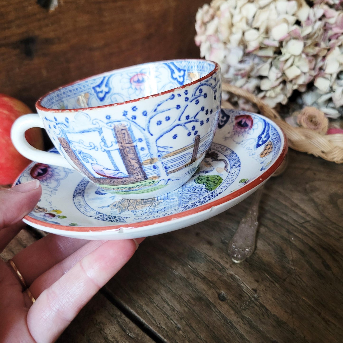 Sarreguemines tea / coffee / chocolate cup & saucer duo, French Chinoiserie style hand colored polychrome on blue transferware c1890 France