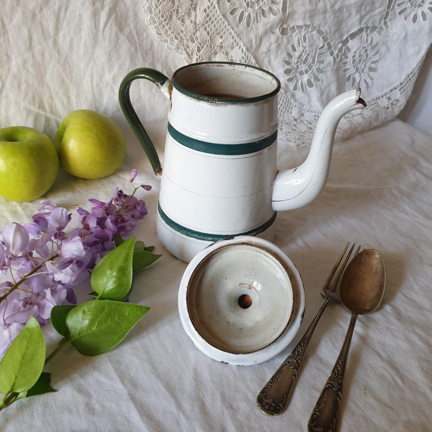 Vintage enamel coffee pot from France shown open with its lid to the side, forest green and white paint
