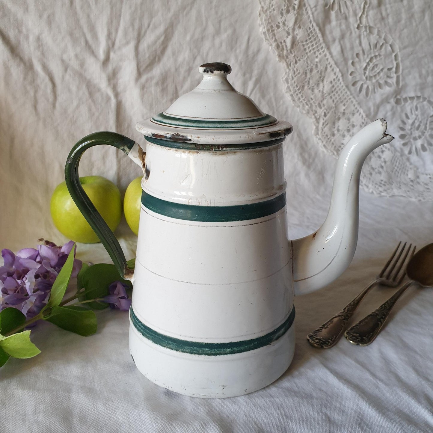 A French enamel coffee pot with a green stripe detail