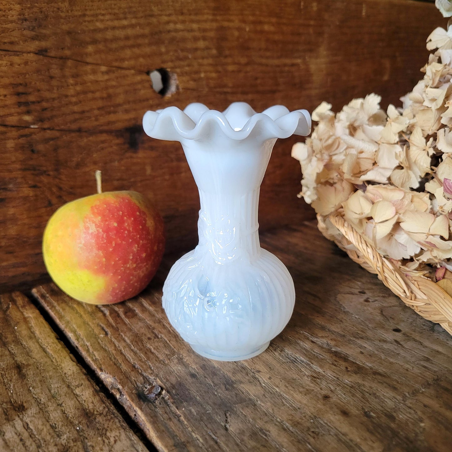 A small French vase in white opaline milk glass, an antique soliflore vase, vintage ruffled rim with ribbon design, hand blown
