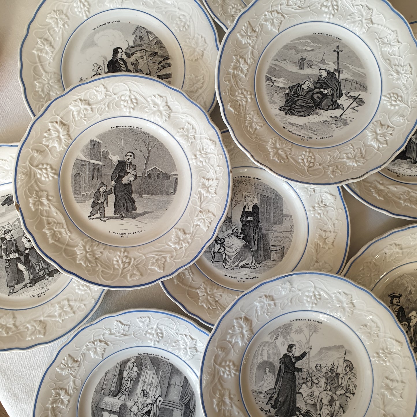 Set 12 French antique fine faience cabinet plates c1856-1860, Christian religious theme of morality in action, black transferware w blue border, Gien, France