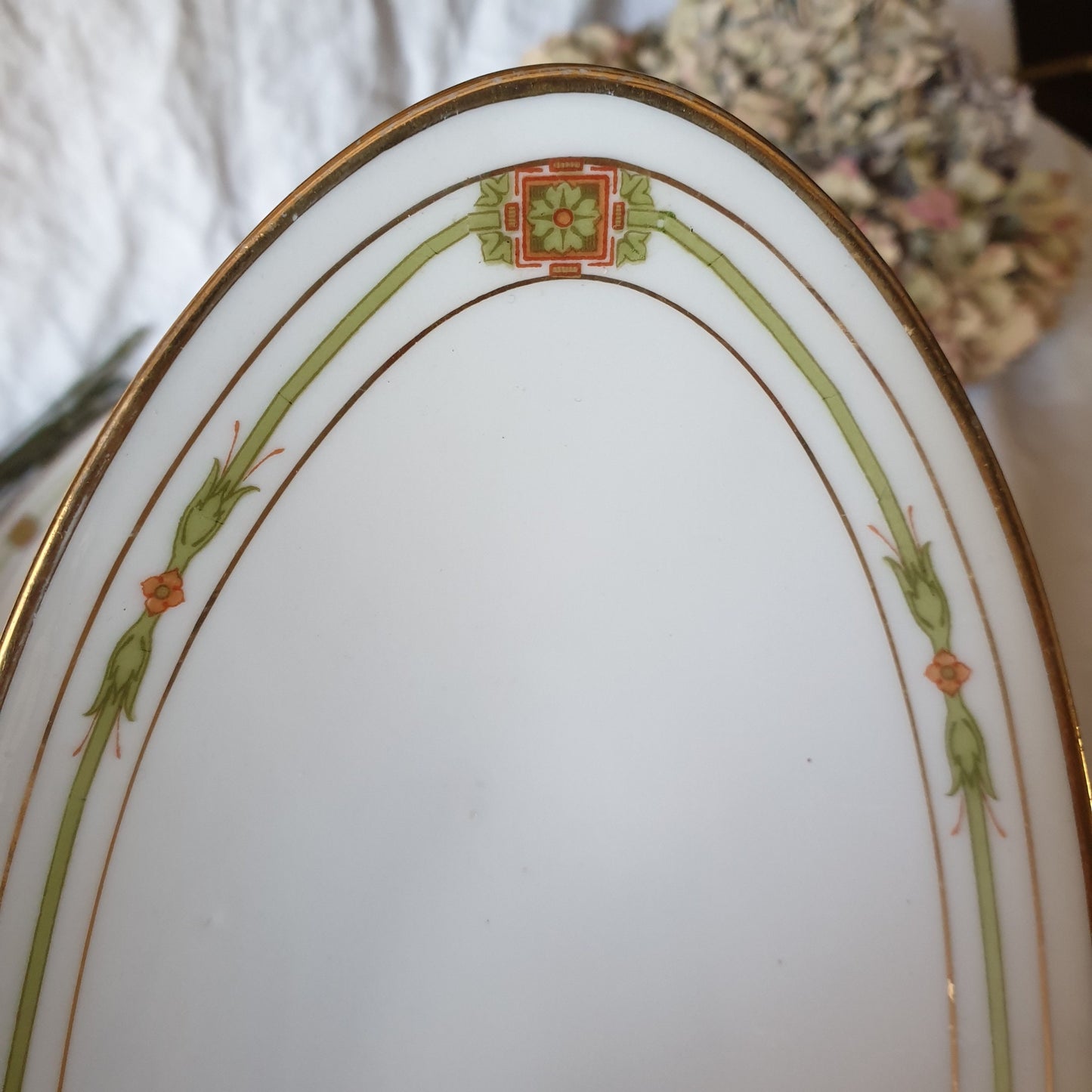 antique Limoges porcelain ravier oval serving dish - polychrome w gold border, orange / green, Belle Epoch design, JB&Cie France