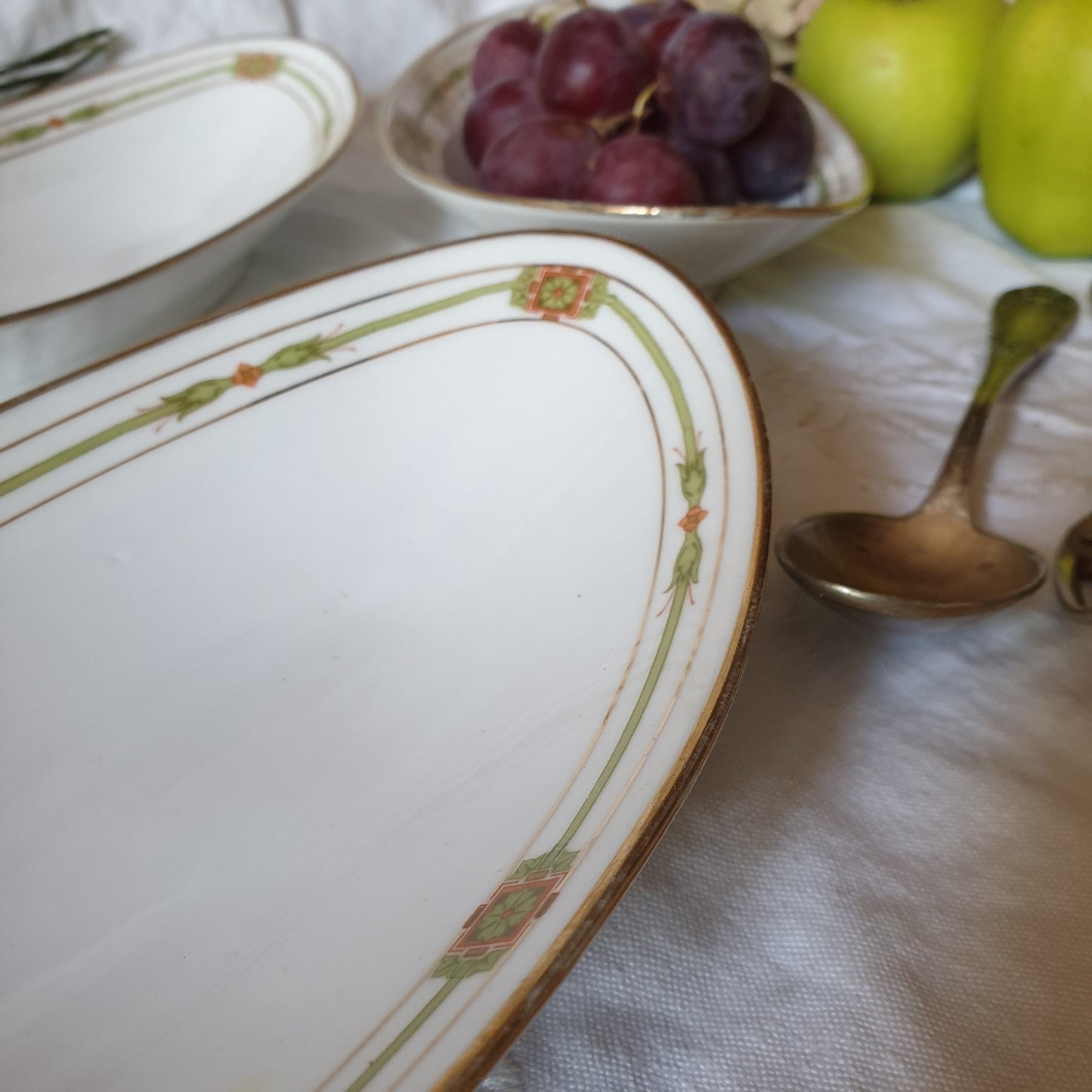 antique Limoges porcelain ravier oval serving dish - polychrome w gold border, orange / green, Belle Epoch design, JB&Cie France