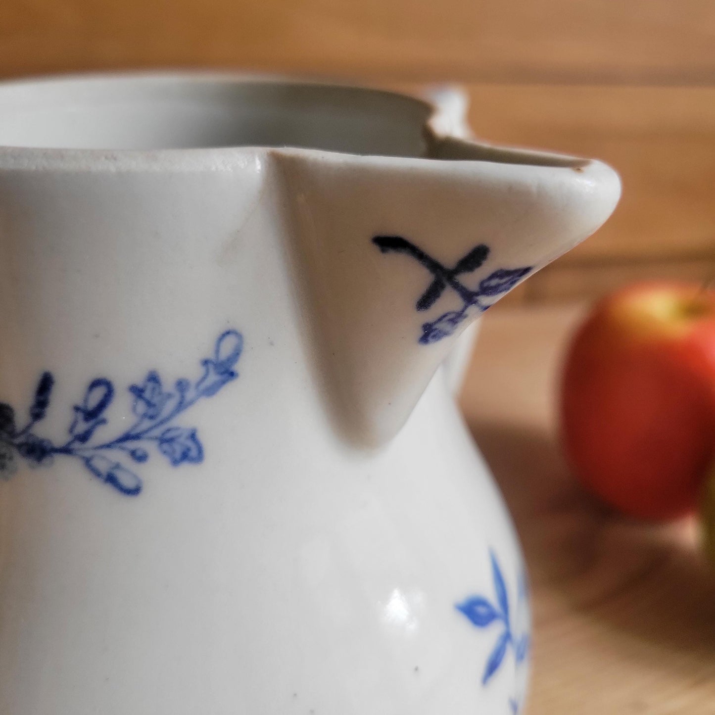Antique stoneware milk jug with offset handle blue and white florals and leaves St Uze France c 1900
