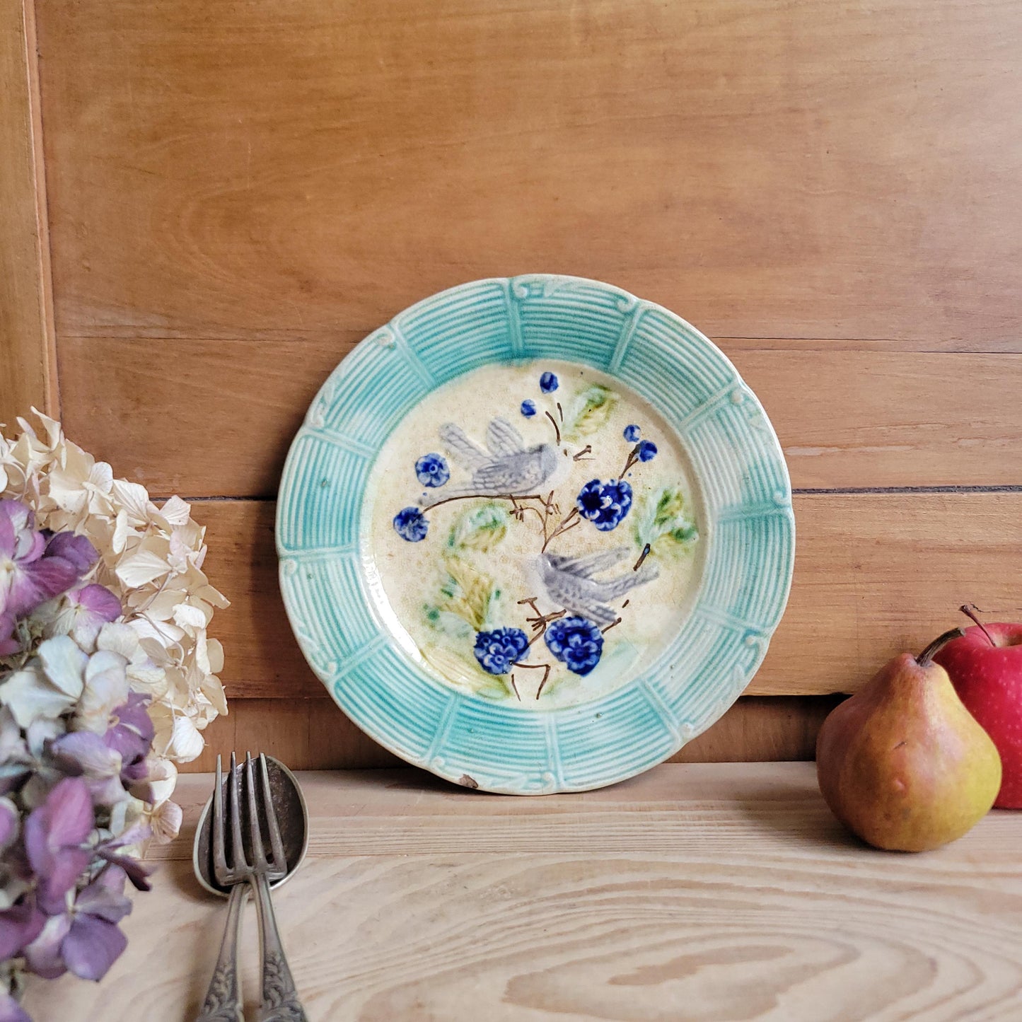 French antique barbotine majolica plate, songbirds on flower branch design, polychrome on cream-yellow ground, ridged border, France c1890